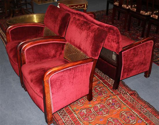 A stained beech bergere style three piece suite